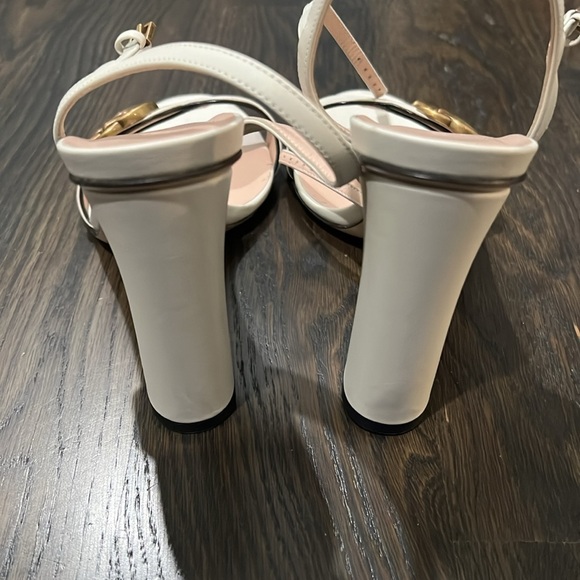 A thick heel balances these Gucci leather
sandals with a retro touch. - Picture 10 of 10